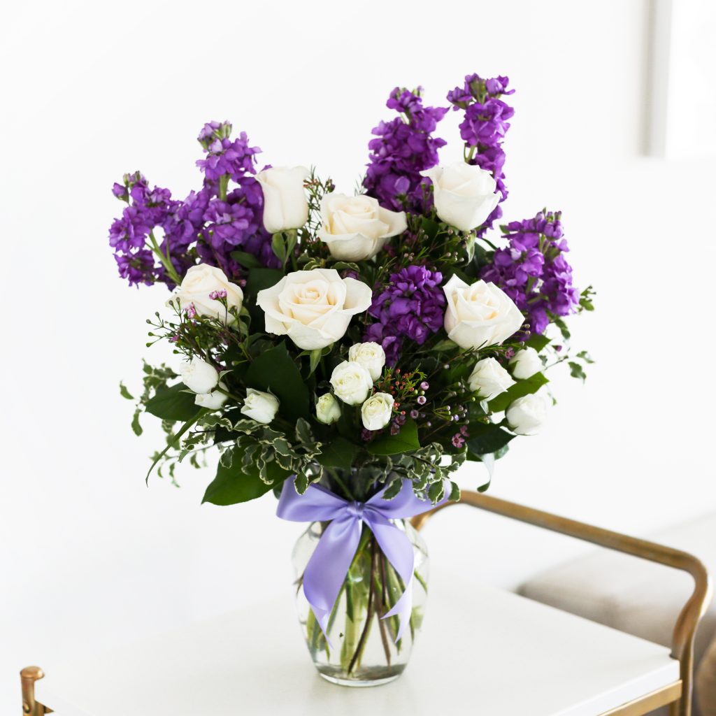 purple stock and white roses