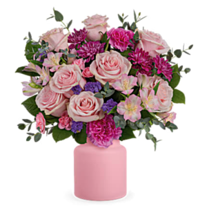 Pink roses fill a beautiful pink vase